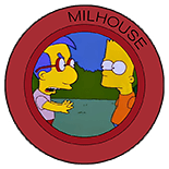 An exasperated Milhouse arguing with his friend, Bart, while Bart looks at Milhouse with a blank, neutral expression on his face