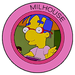 Milhouse at school in mid-speech and gesturing with one hand in the air as his other hand holds a book